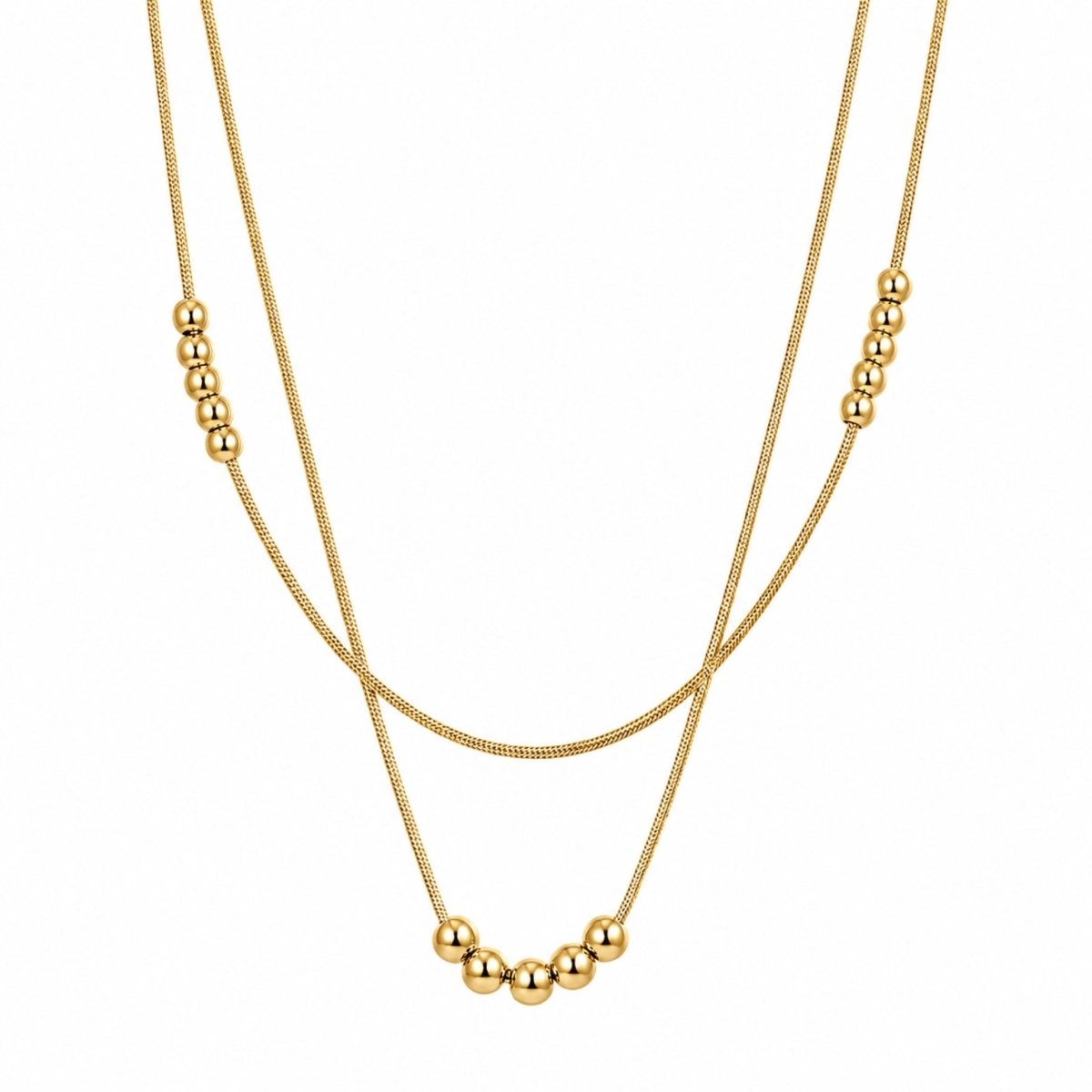 Close up of minimalist double layered snake chain necklace in polished gold featuring 4mm and 5mm metal bead accents.