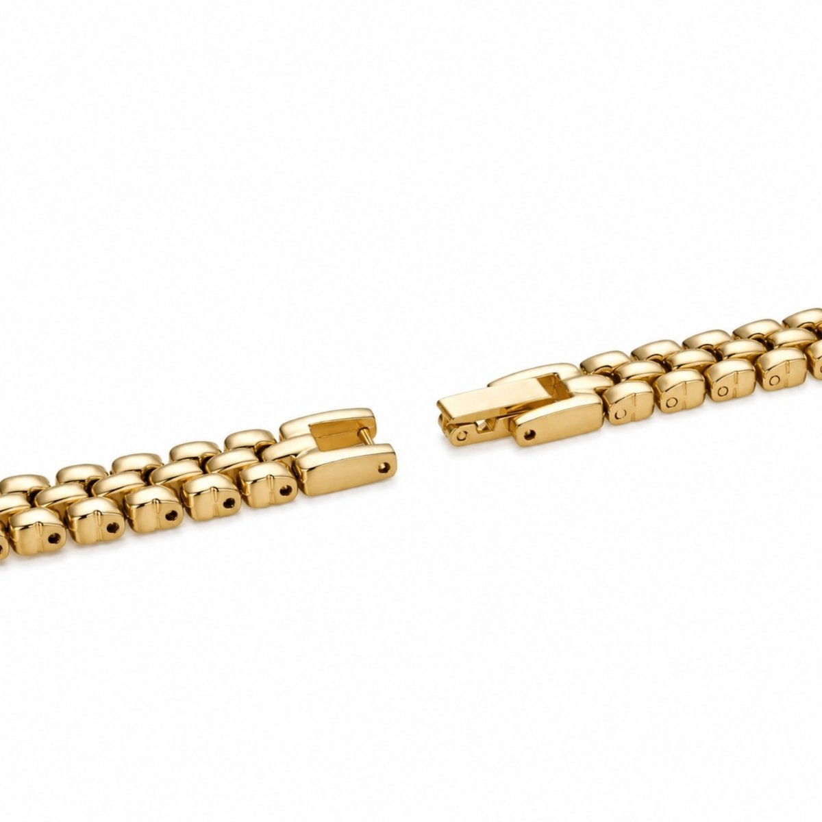 Detailed view of the premium gold-tone folding jewelry clasp closure on the dainty Kouvr women's link watch band.