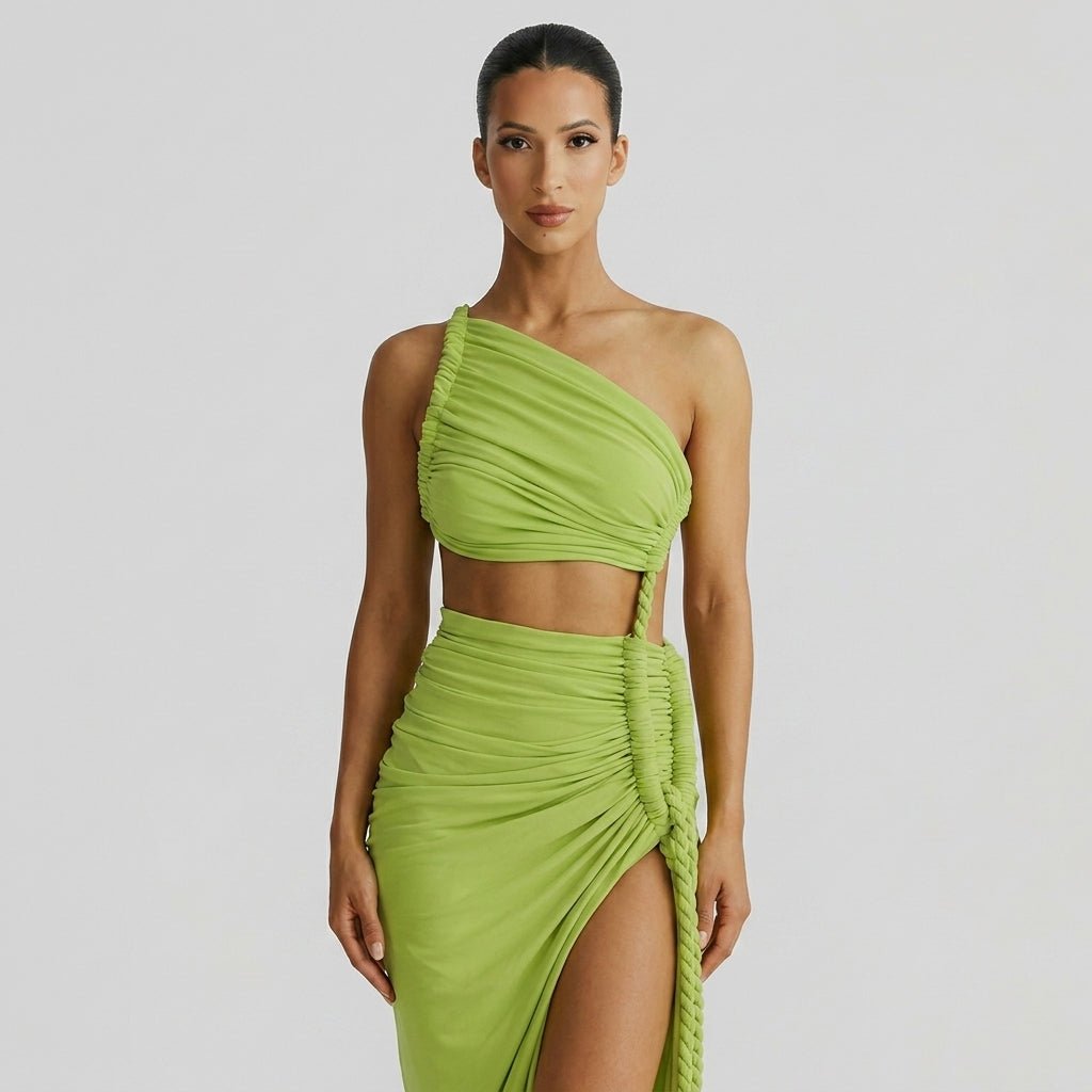 Close up of Kouvr green ruched bodice midriff cutout and braided rope side feature