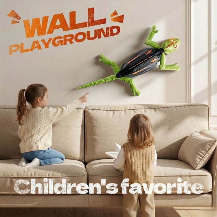 A young boy pointing at a large, orange and black remote control wall climbing insect toy on the wall of a modern home.