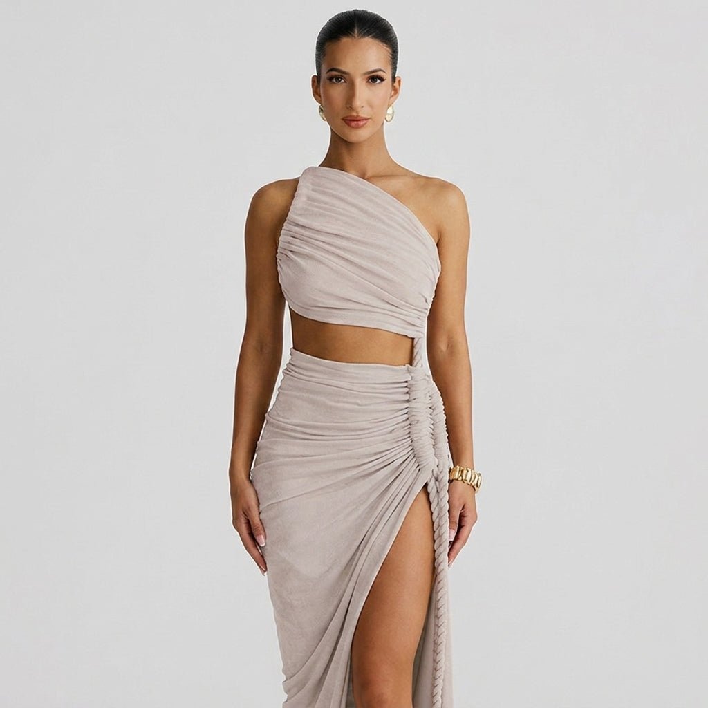 Close up showing draped bodice, waist cutout, and braided rope trim on a taupe high slit maxi dress.