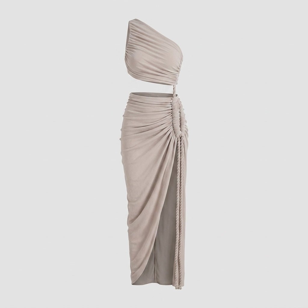 Grey asymmetrical one shoulder cutout maxi dress floating against a light grey background.