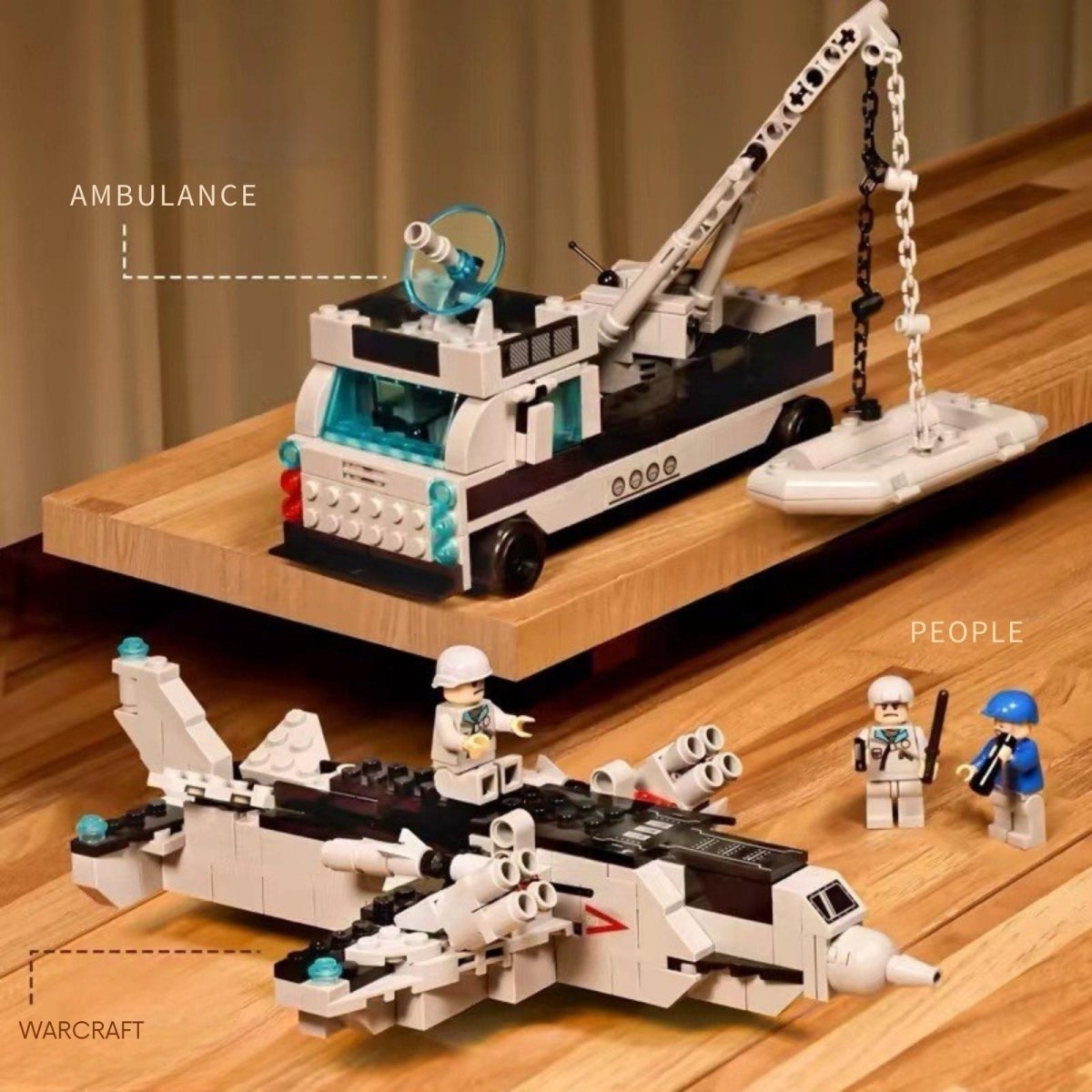 Detailed view of the individual models from the Kouvr construction set, including the ambulance, lifeboat, and warcarft.