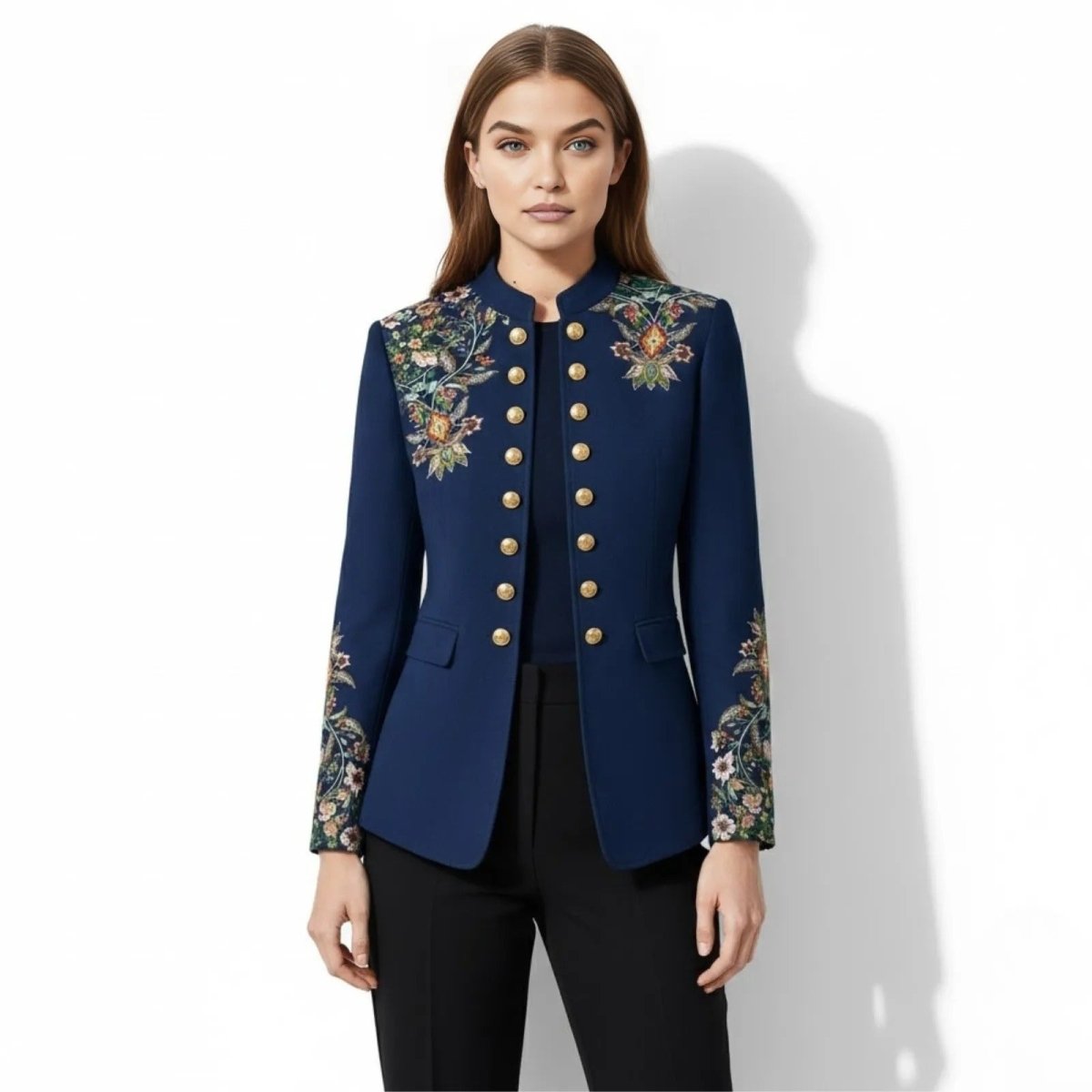 Model wearing the Kouvr Aiko multicolor embroidered military jacket , front view, showcasing the gold buttons and shoulder embroidery.