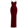 Model wearing Kouvr Fashion Amoura Gown in burgundy showing side mesh panel detail