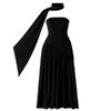 Black Kouvr evening gown with a cape on a white background
