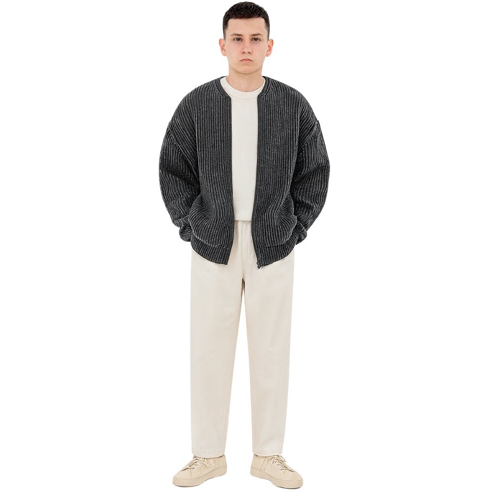 collarless bomber jacket," "minimalist sweater jacket," "quiet luxury knitwear," "structured knit," "transitional outerwear