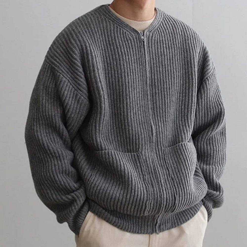 collarless bomber jacket," "minimalist sweater jacket," "quiet luxury knitwear," "structured knit," "transitional outerwear