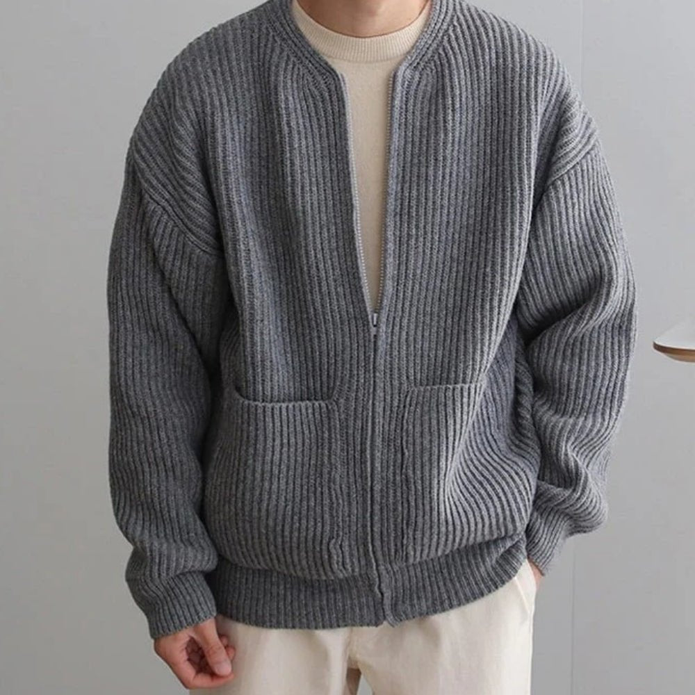 collarless bomber jacket," "minimalist sweater jacket," "quiet luxury knitwear," "structured knit," "transitional outerwear