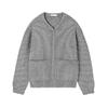 collarless bomber jacket," "minimalist sweater jacket," "quiet luxury knitwear," "structured knit," "transitional outerwear
