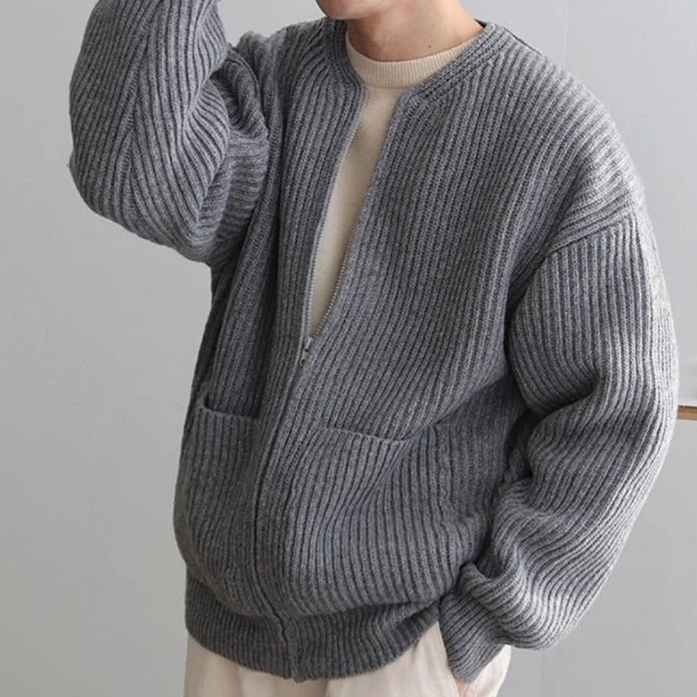 collarless bomber jacket," "minimalist sweater jacket," "quiet luxury knitwear," "structured knit," "transitional outerwear