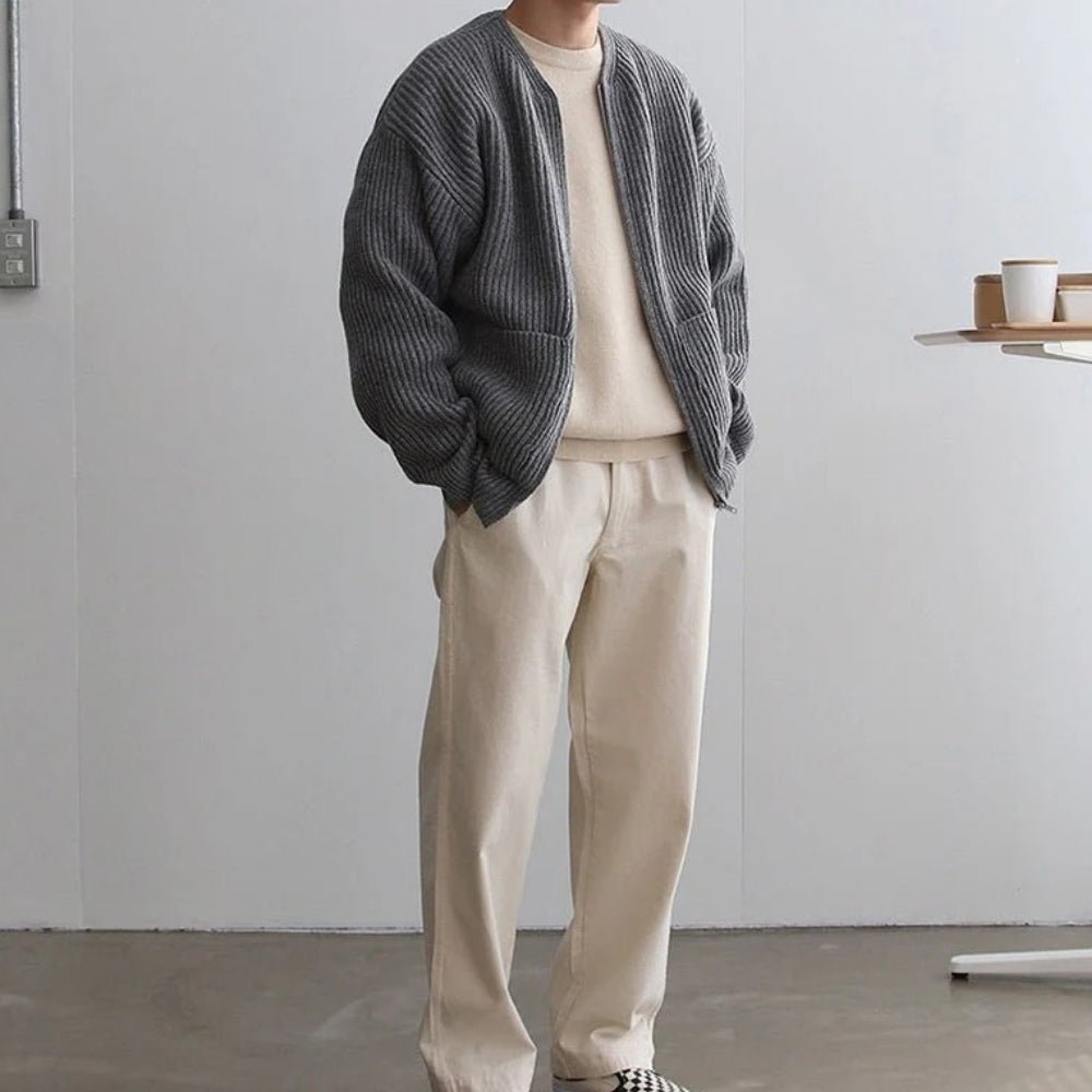 collarless bomber jacket," "minimalist sweater jacket," "quiet luxury knitwear," "structured knit," "transitional outerwear