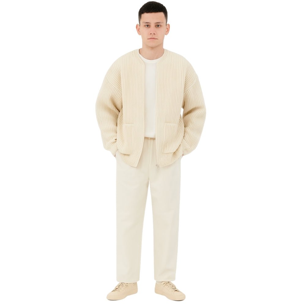 Minimalist zip up sweater, collarless knit outerwear, luxury oversized cardigan, quiet luxury jacket, off-white structured knit, contemporary men's knitwear