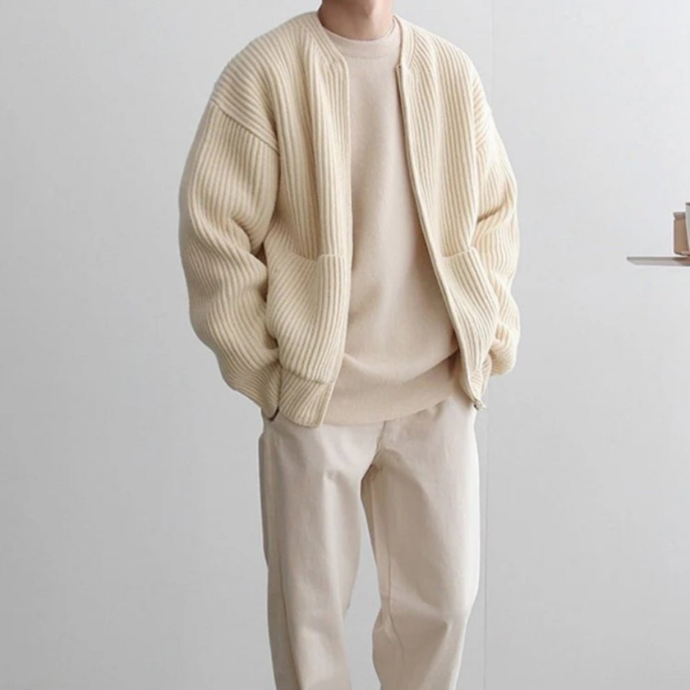 Minimalist zip up sweater, collarless knit outerwear, luxury oversized cardigan, quiet luxury jacket, off-white structured knit, contemporary men's knitwear