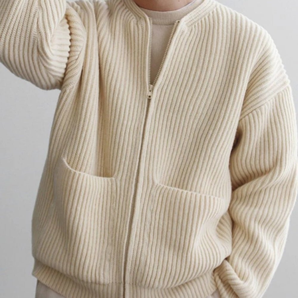 Minimalist zip up sweater, collarless knit outerwear, luxury oversized cardigan, quiet luxury jacket, off-white structured knit, contemporary men's knitwear