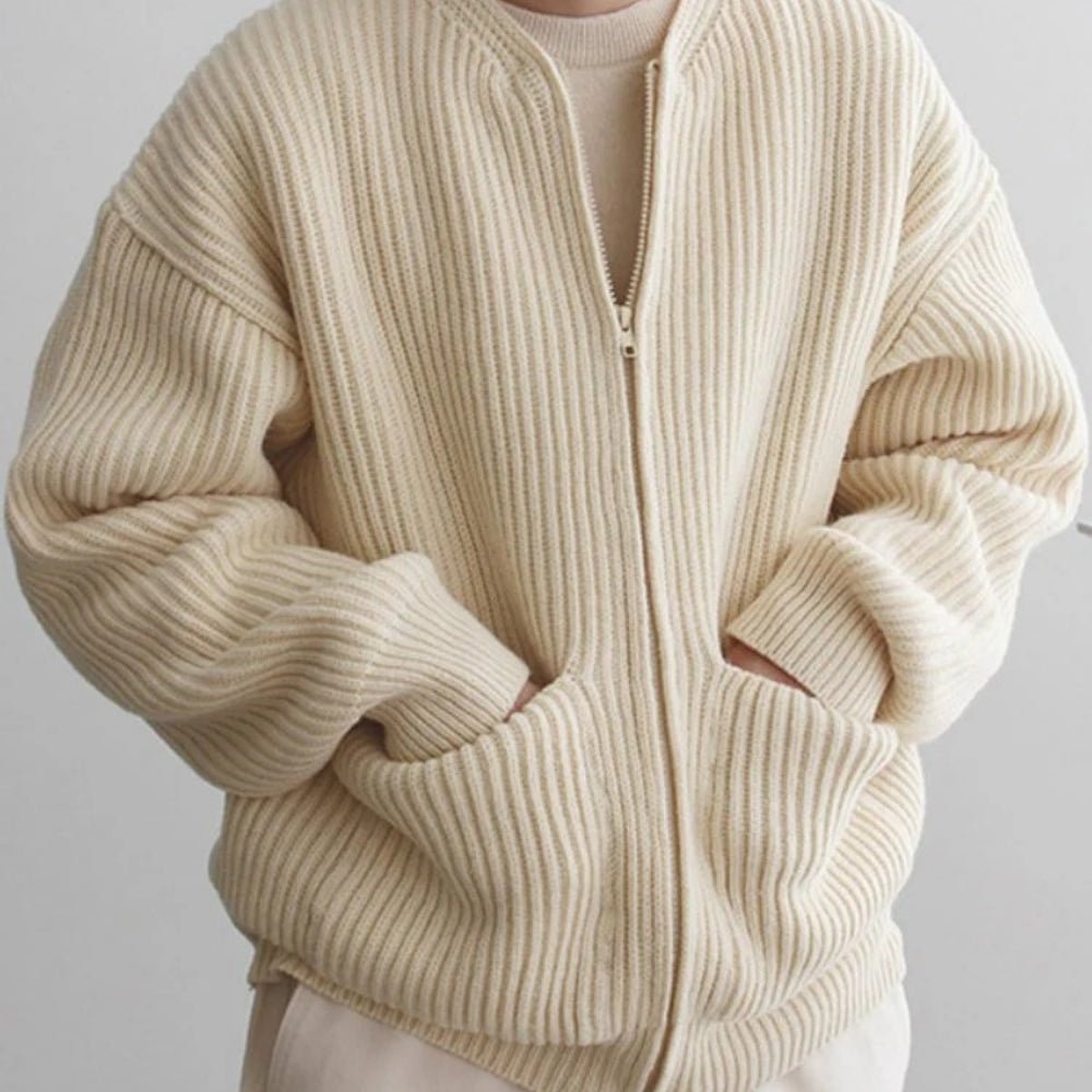 Minimalist zip up sweater, collarless knit outerwear, luxury oversized cardigan, quiet luxury jacket, off-white structured knit, contemporary men's knitwear