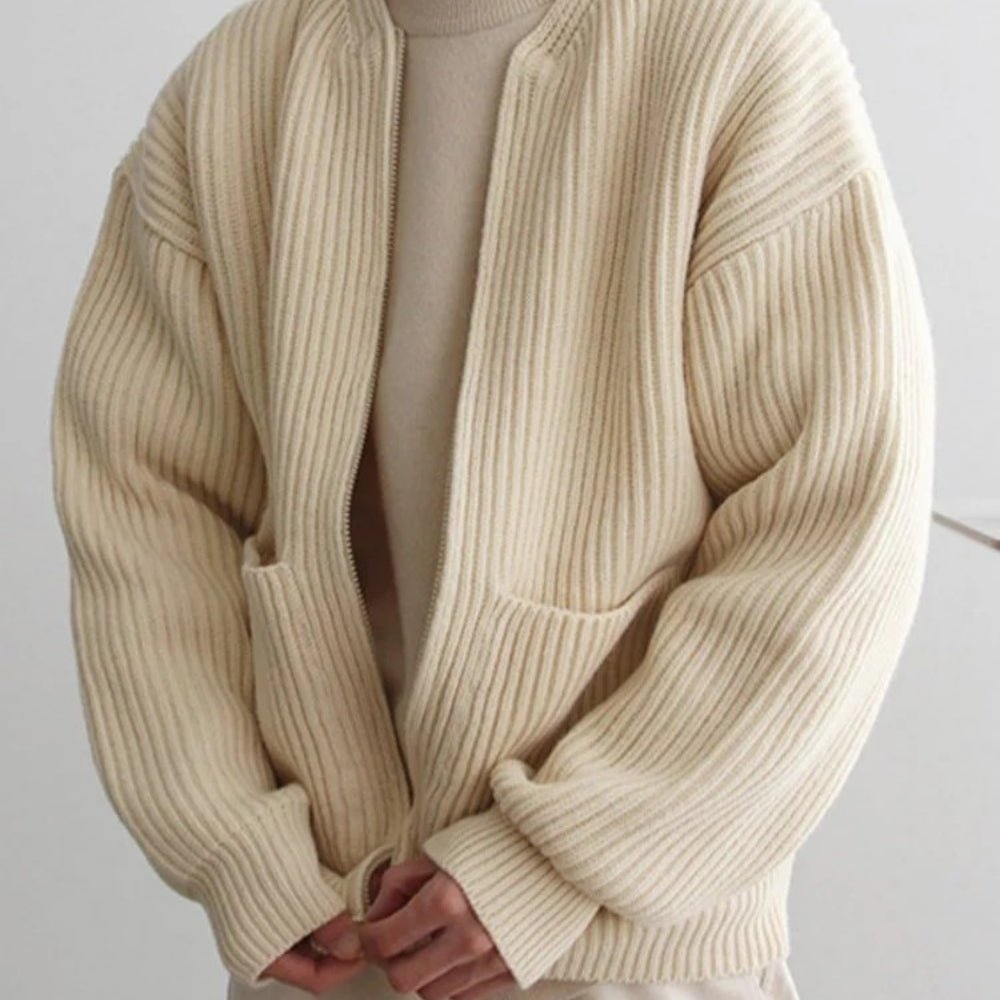 Minimalist zip up sweater, collarless knit outerwear, luxury oversized cardigan, quiet luxury jacket, off-white structured knit, contemporary men's knitwear