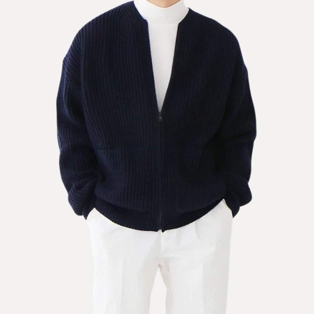 quiet luxury menswear," "minimalist layering piece," "structured knitwear," "transitional outerwear," "designer cardigan