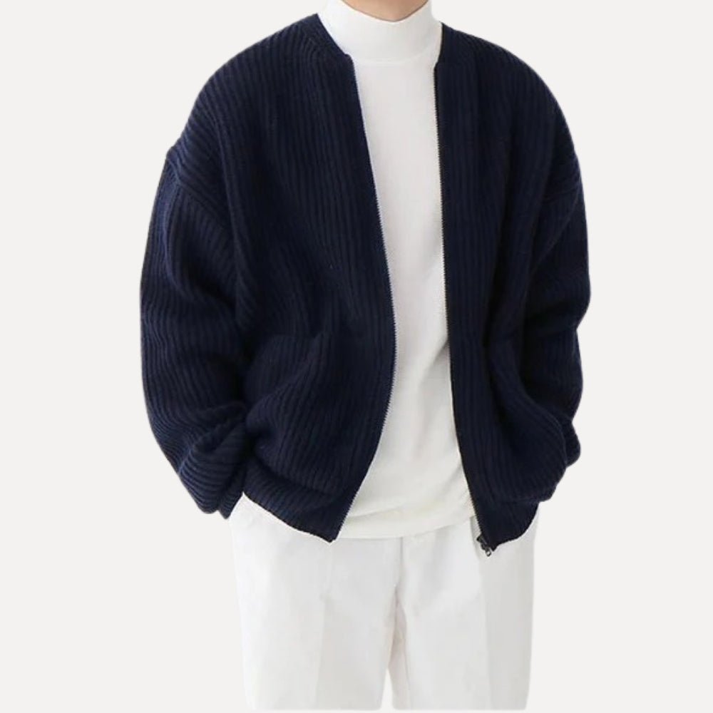 quiet luxury menswear," "minimalist layering piece," "structured knitwear," "transitional outerwear," "designer cardigan