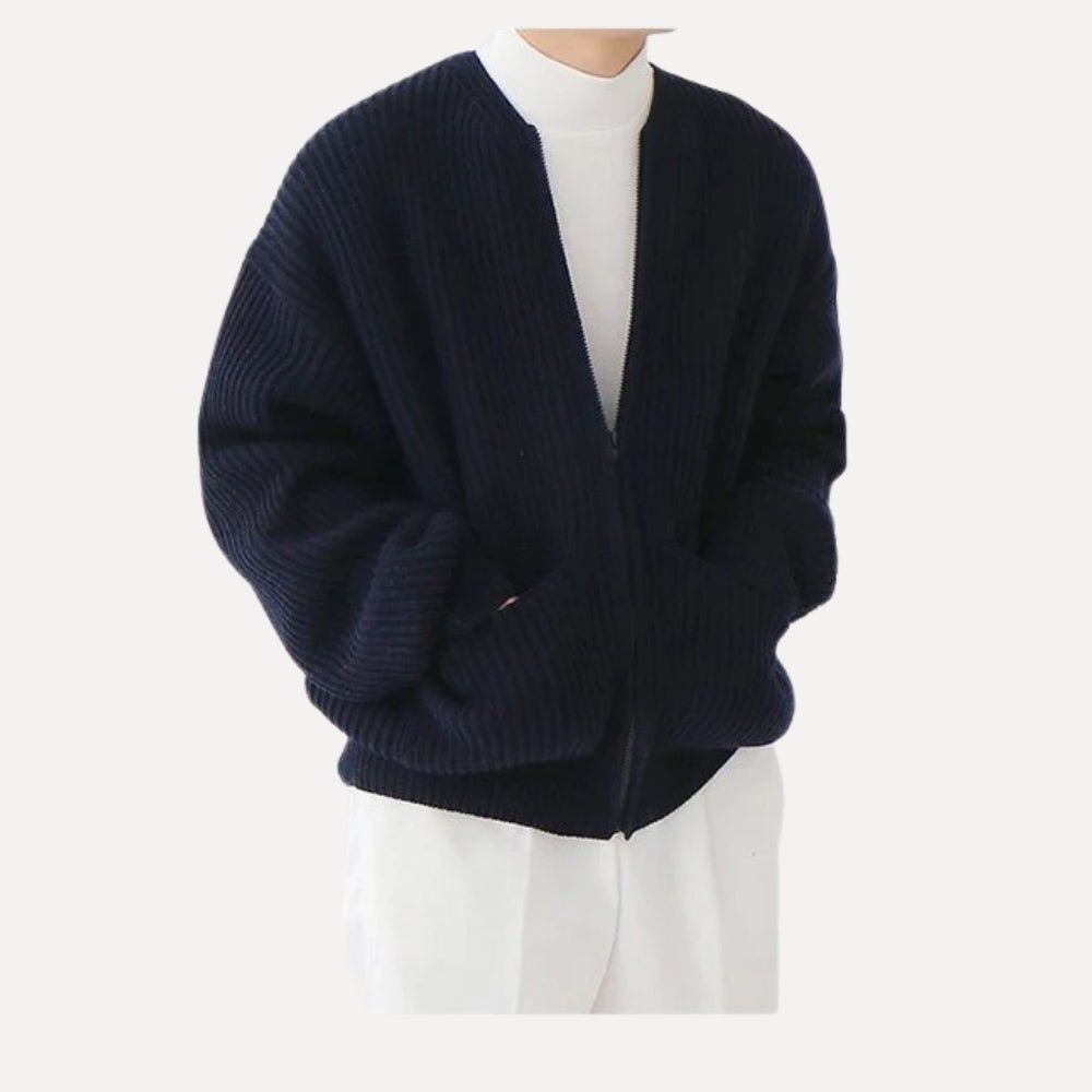 quiet luxury menswear," "minimalist layering piece," "structured knitwear," "transitional outerwear," "designer cardigan