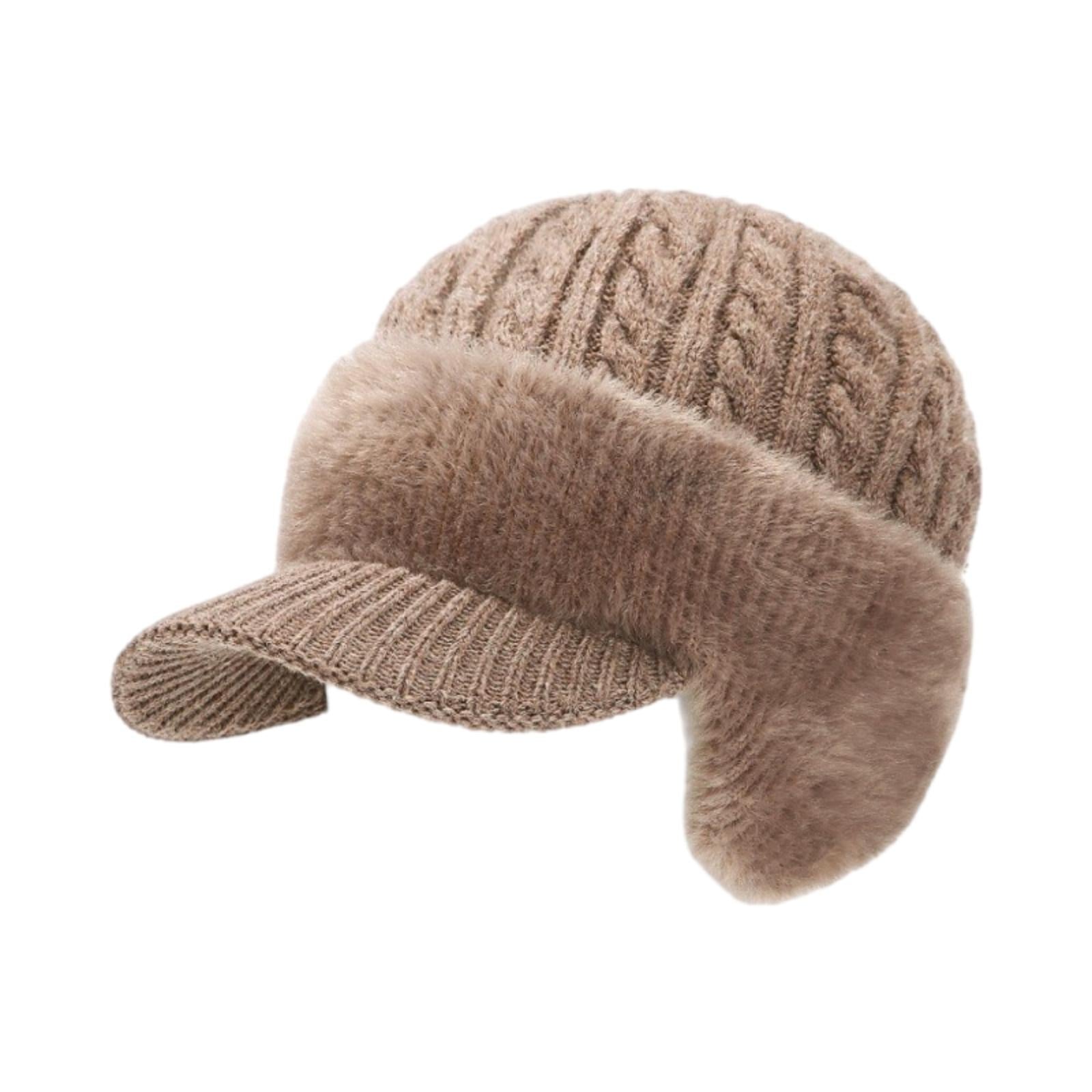 Kouvr Aspen cable knit trapper hat with faux fur ear flaps and visor in taupe brown on a white background.