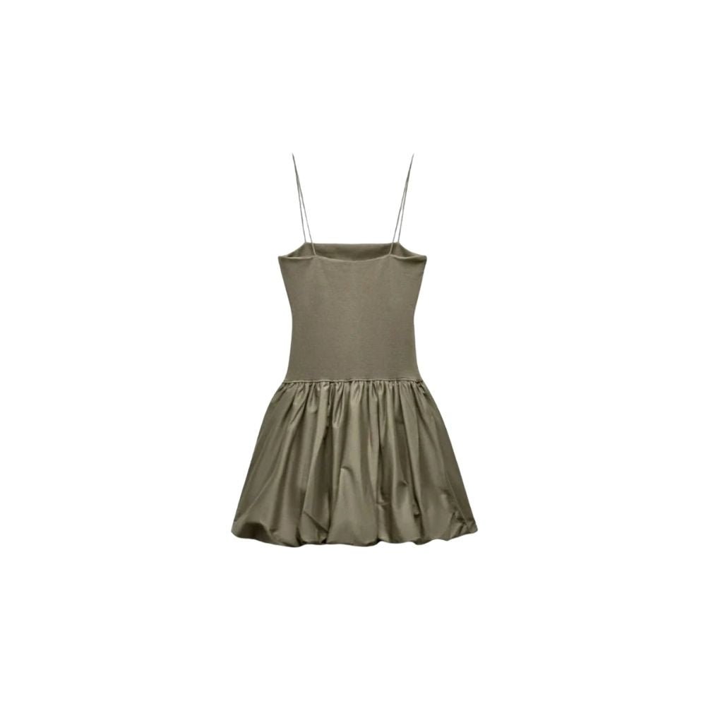 Green  kouvr dress with thin straps on a white background