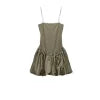 Model from the back wearing the Kouvr Aubrey olive green drop waist mini dress with a sculptural bubble skirt