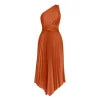Woman wearing Kouvr's Audrine one-shoulder pleated midi dress in copper, showcasing the twisted waist and flowing asymmetrical hem
