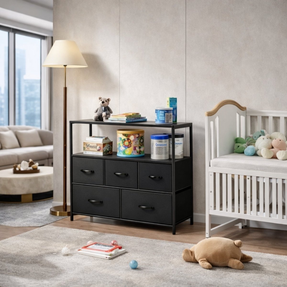 The Kouvr 5-drawer black dresser used for baby supply and toy storage in a bright and modern nursery setting.