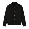 Model wearing the Kouvr men's black textured corduroy and nylon trucker jacket