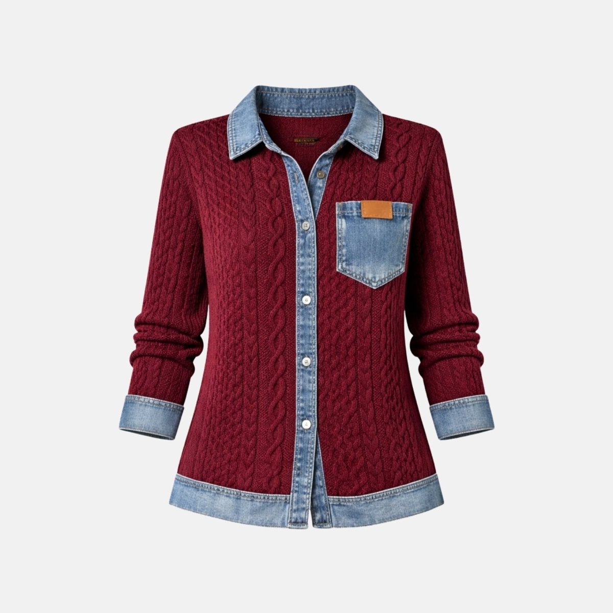 Front flat lay of the burgundy cable knit cardigan emphasizing the contrast light wash denim collar, cuffs, chest pocket, and button placket.
