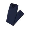 Model wearing the Kouvr Dark Blue Pant in navy with a light blue dress shirt and white leather sneakers