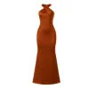 Woman wearing Kouvr Camina brown satin halter neck maxi dress with an open back