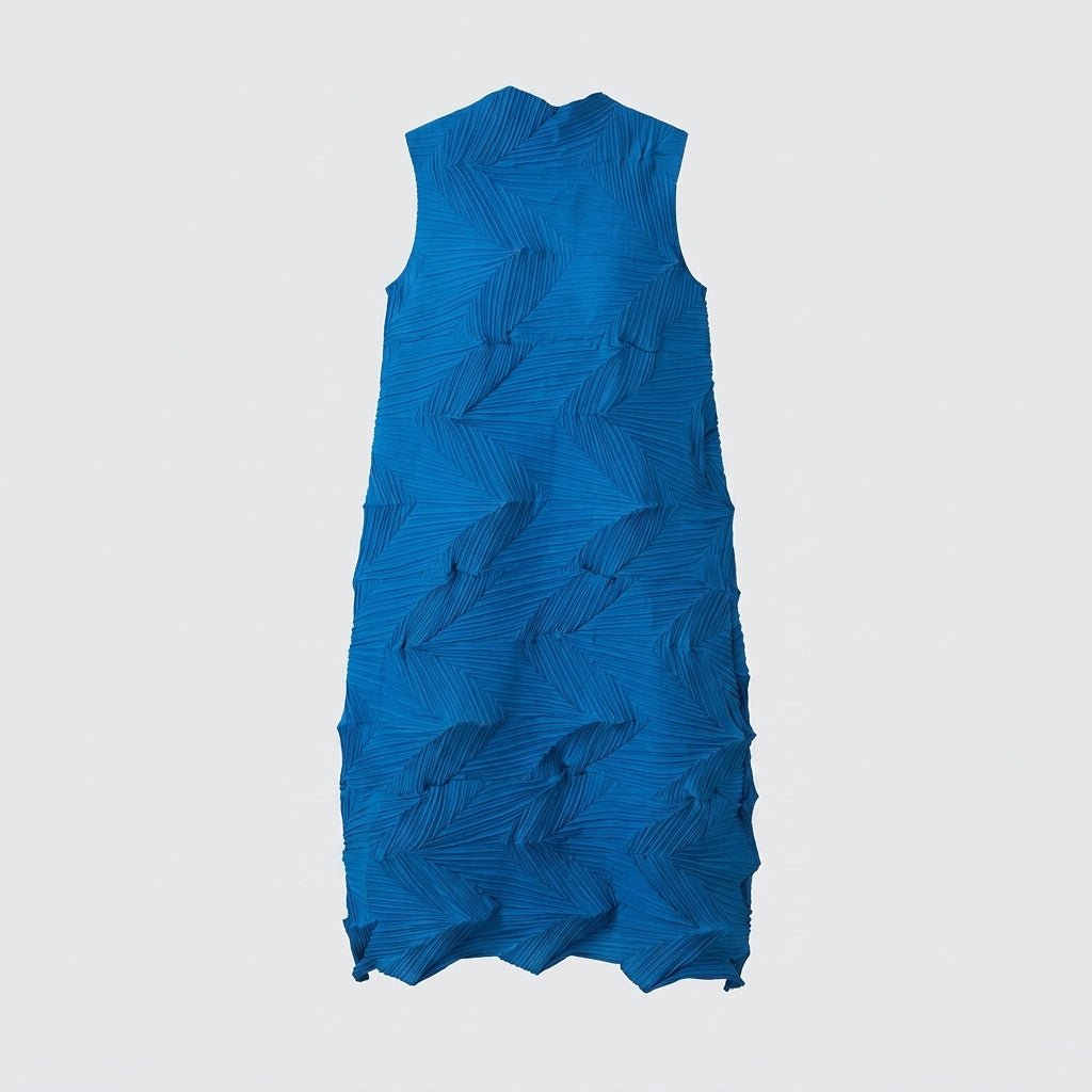 Studio flatlay of the back of the Kouvr cobalt blue textured chevron pleated sleeveless midi dress.