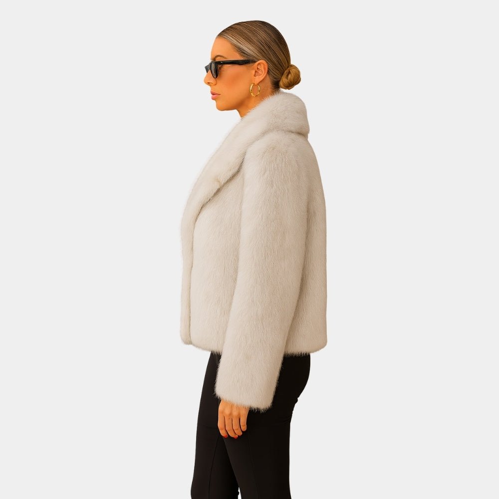  Luxury vegan fur coat
- Women's plush winter jacket
- Cream evening jacket
- Wide collar faux fur coat
- Off-white cropped outerwear 