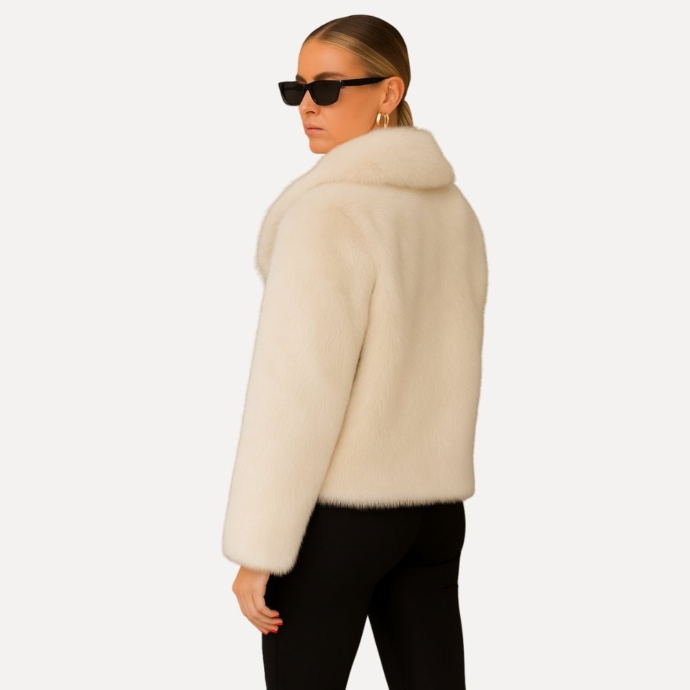 quiet luxury outerwear, minimalist winter jacket, cropped evening coat, wedding guest jacket, what to wear over a formal dress, ethical fur coat, faux mink jacket