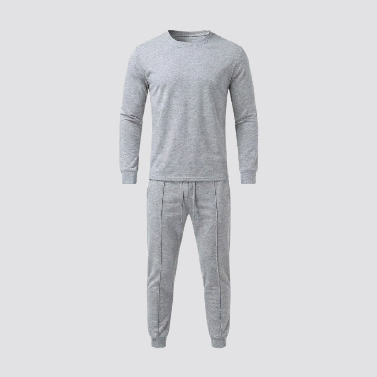 Flat lay of the Kouvr Crue Set men's heather light grey loungewear set showing the front of the crewneck top and jogger pants.