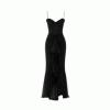 Black kouvr evening gown with ruched details on a white background