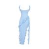 Blue Kouvr jumpsuit on a white background