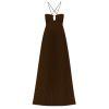 Model wearing Kouvr brown pleated floor-length halter gown with side cutouts and an open back