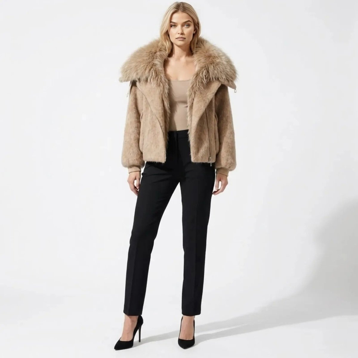 Model wearing the Kouvr Dorothy beige wool blend aviator jacket with a large faux fur collar, styled with black pants and heels.
