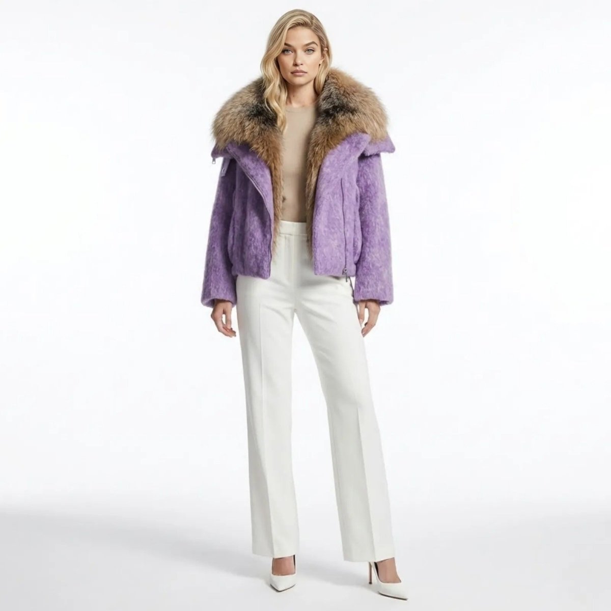 Model wearing the Kouvr Dorothy purple wool moto jacket with a large brown fur collar, paired with white trousers, shown from the front.