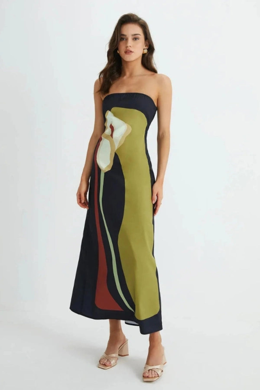 Model wearing the Kouvr Elizabeth abstract floral strapless evening dress