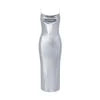 Model wearing Kouvr Elysian silver metallic backless halter gown showing side profile
