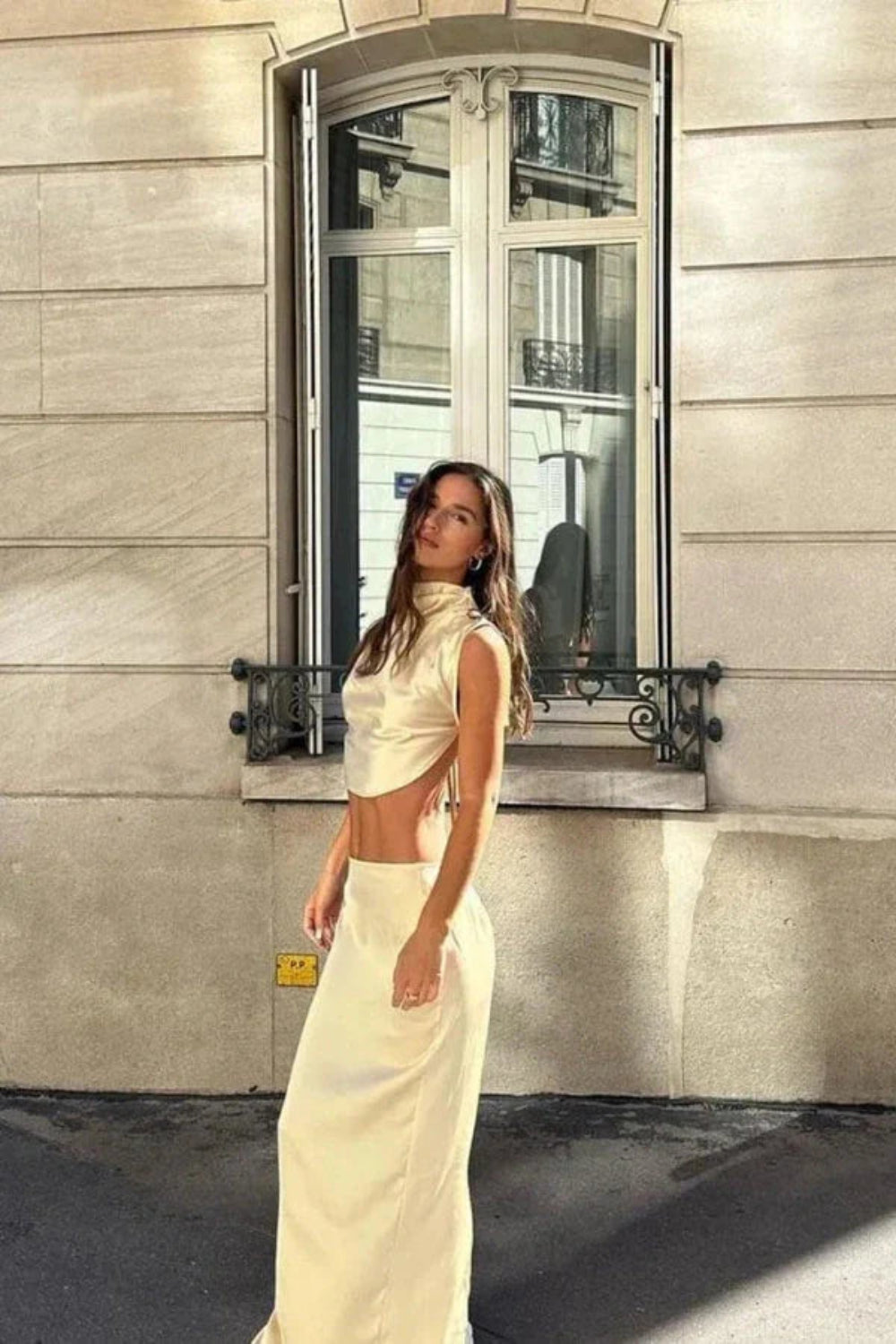 ensemble," "backless evening top," "draped neckline," "lustrous," "silk-like," "gala outfit," "wedding guest dress alternative," and "vacation formalwear