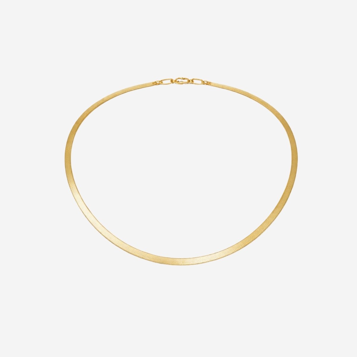 The Amelie Gold Snake Chain Necklace by Kouvr Fashion, a flat herringbone choker with 18k gold plating, shown on a white background.