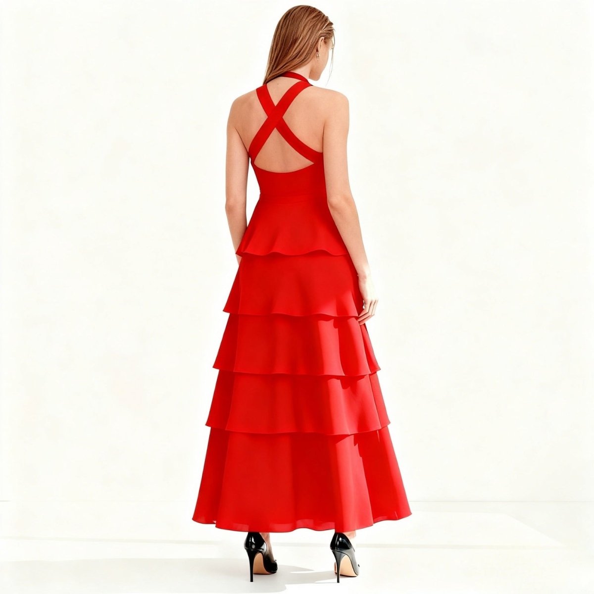 Red Kouvr tiered dress with open back on a white background