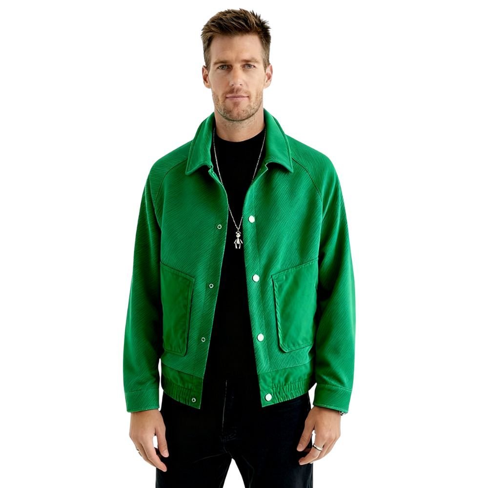 Man wearing a green kouvr jacket on a white background