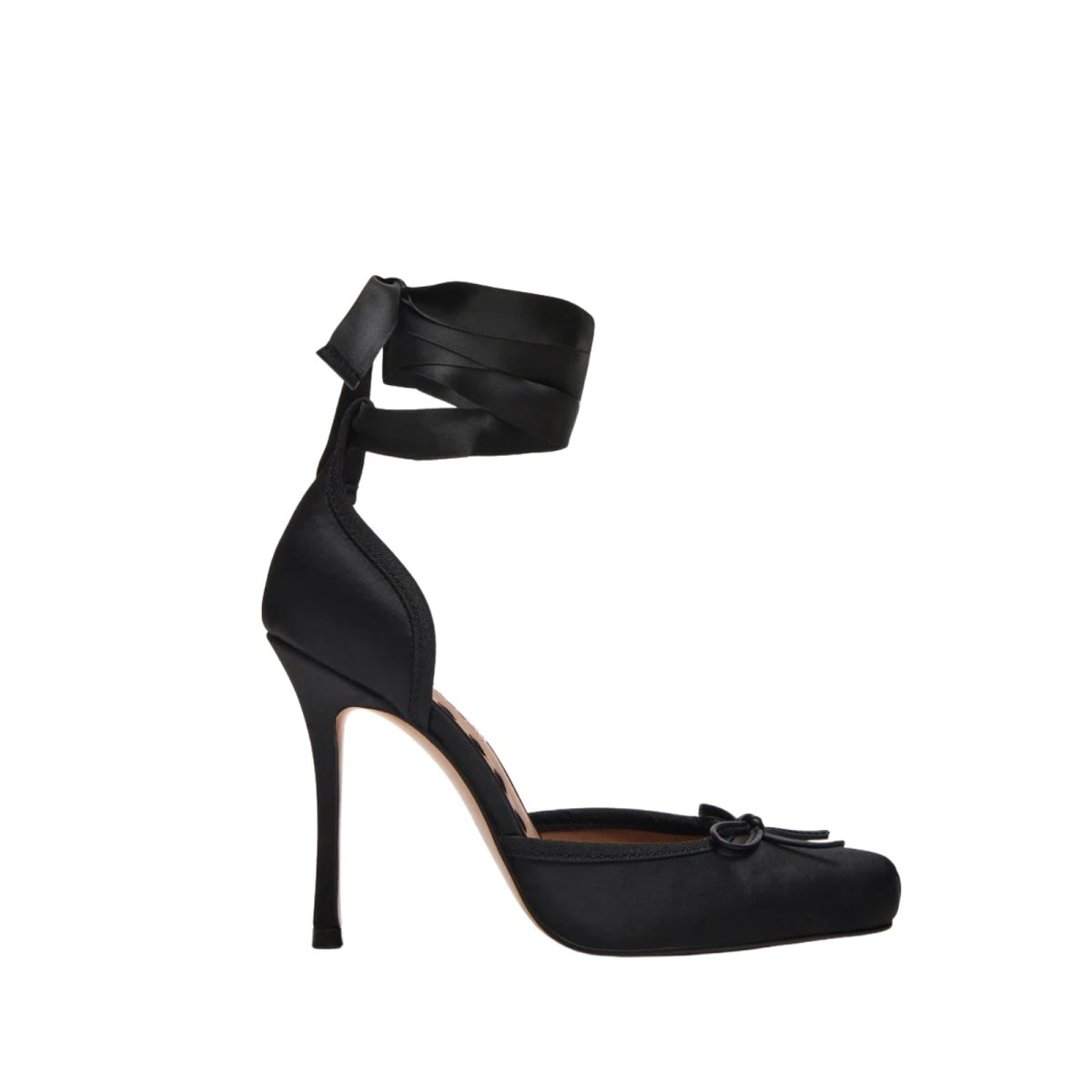 Black kouvr high-heeled shoe with ribbon detail on a white background