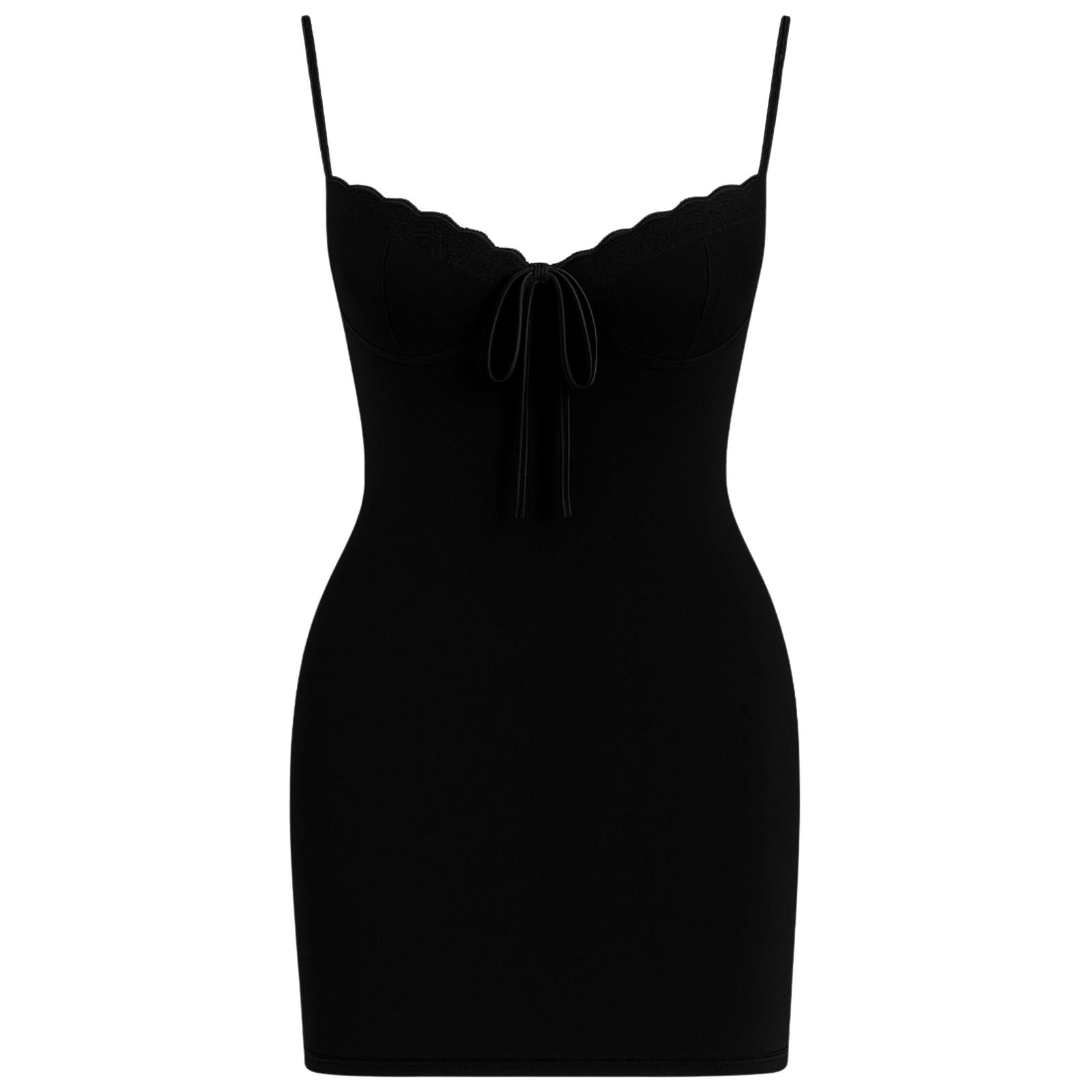 Black kouvr dress with thin straps on a white background